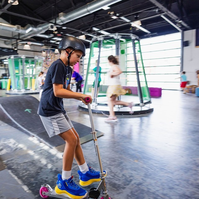 Child Scootering at Keystone Kidspace
